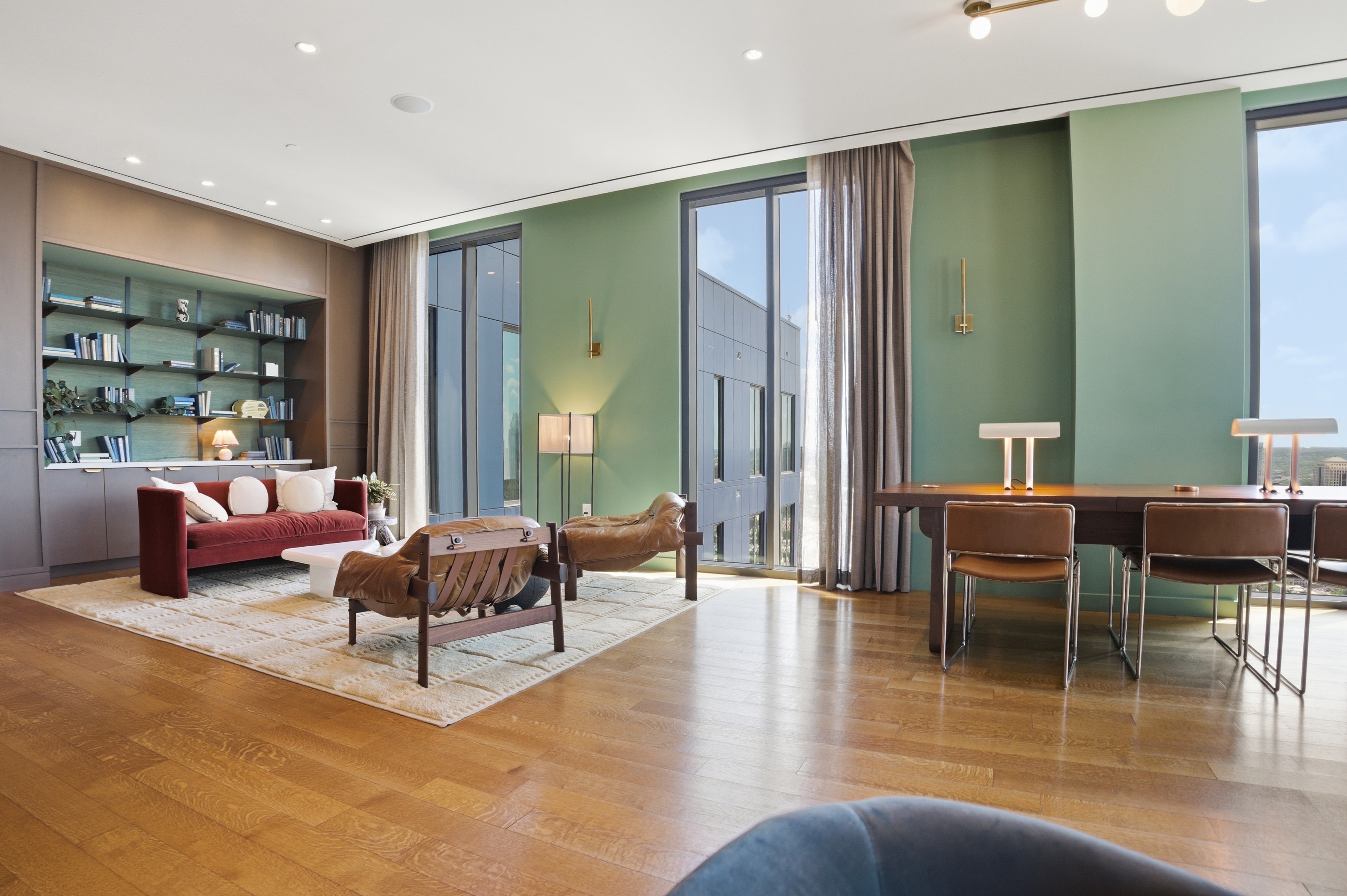 Penthouse living room green walls